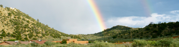 Photo of Arizona landscape with a double rainbow
